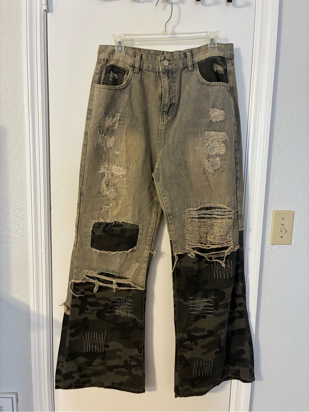 Distressed Jeans with Camo Patchwork and embroidered designs
